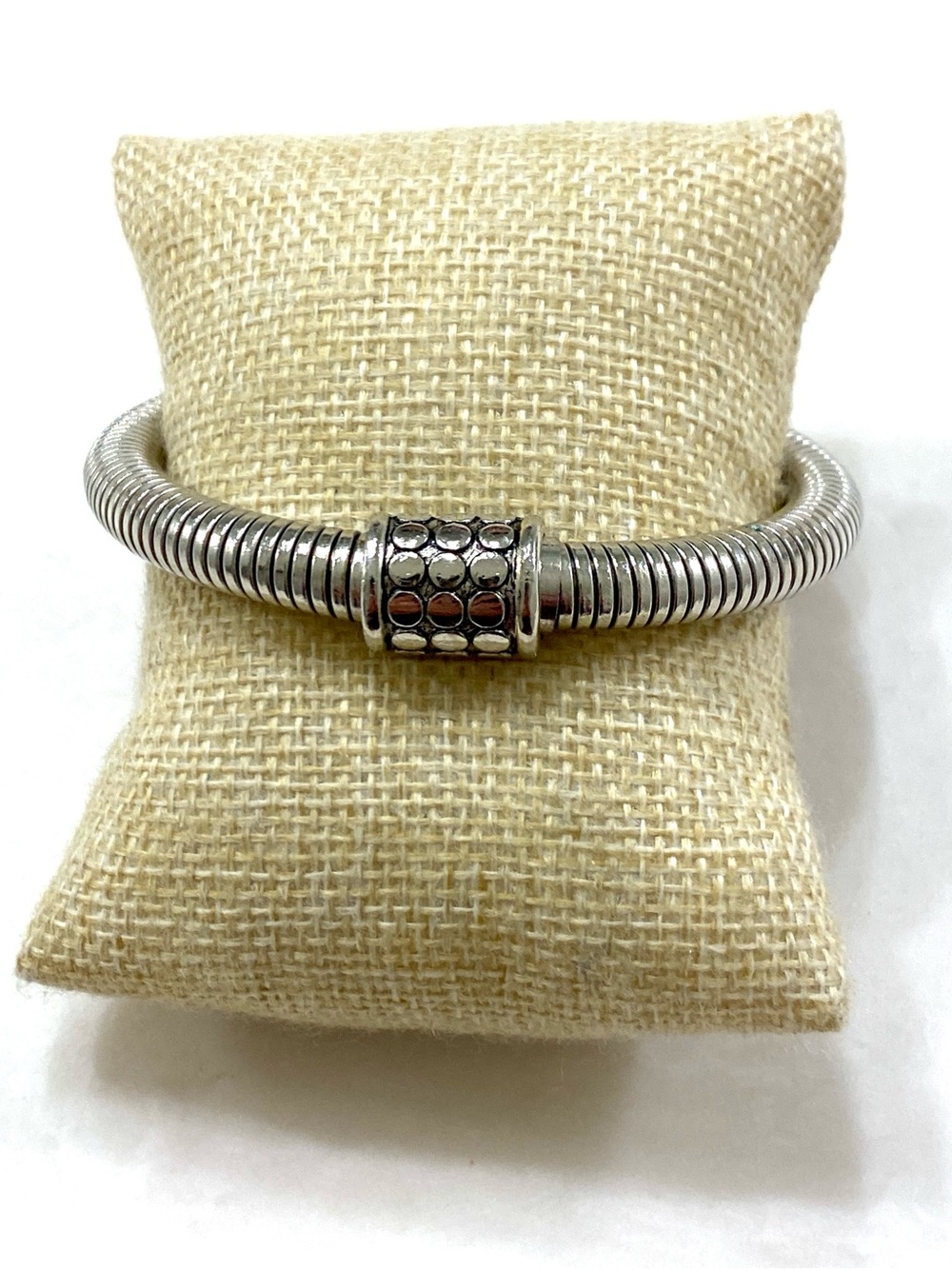 Polished Silver-Tone Coil Bracelet with Decorative Clasp
